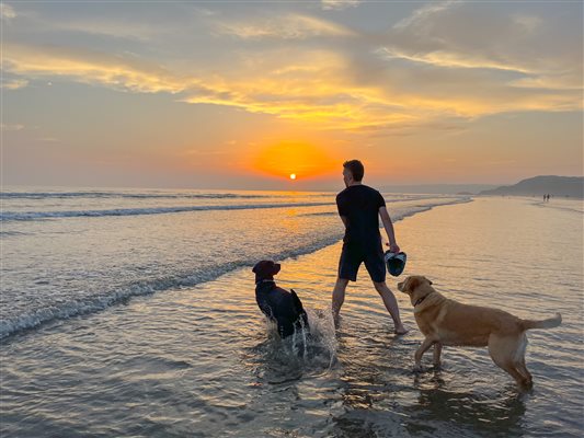 Sunset in Black Rock sands Morfa Bychan Beach in Eryri Snowdonia North Wales